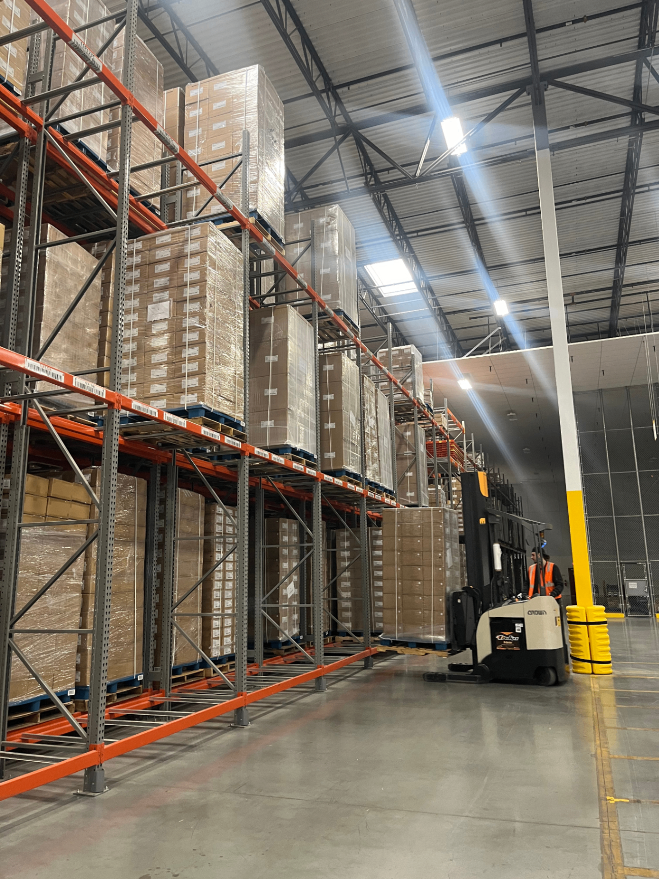 Double deep racking system with reach truck operation